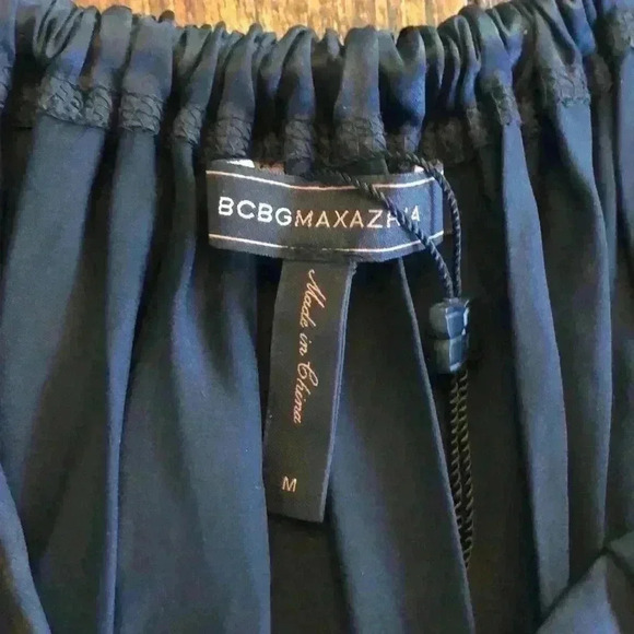 BCBG Maxazria | Beautiful 100% Silk Black Peplum, Tie Halter Top - Picture 2 of 5
